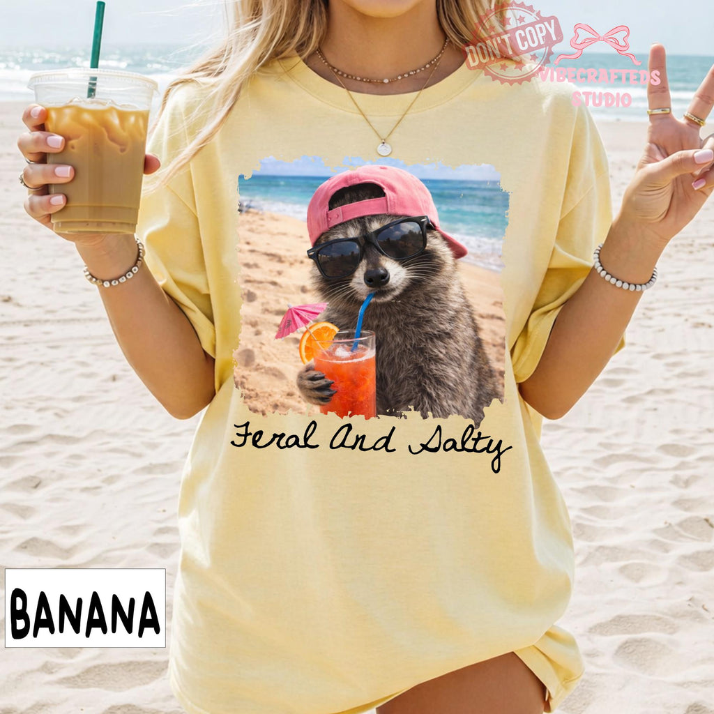 Feral And Salty Comfort Colors T-Shirt  Funny Beach Raccoon Shirt  Salty Summer Vacation Graphic Tee  Coastal Raccoon Meme Shirt NNA